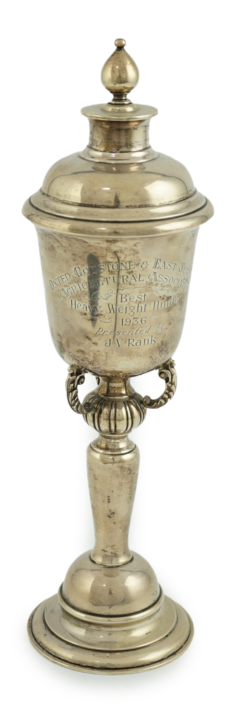 A George V silver presentation trophy cup and cover, by Goldsmiths & Silversmiths Co Ltd